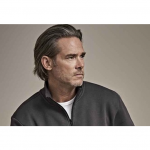 Man in a grey zip sweater