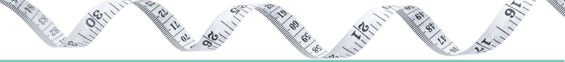 Coiled white tape measure against a white background