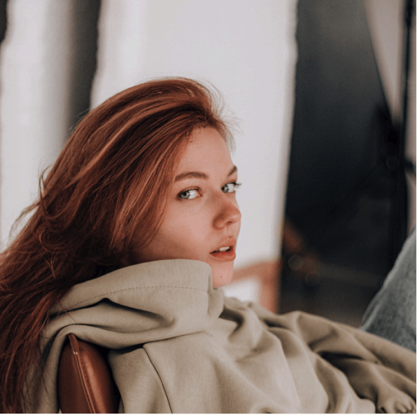 A woman turning to the camera