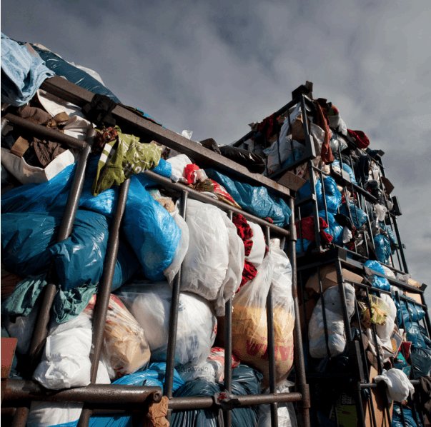 A pile of rubbish bags in cages
